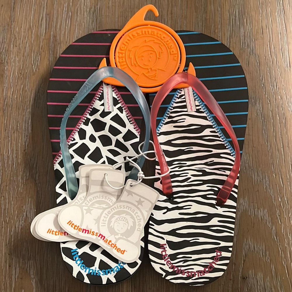Little miss matched flip flops size 7-8 new